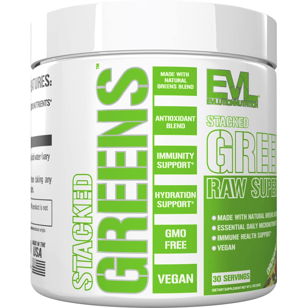 Evlution Stacked Greens Spirulina Powder mixed in a glass of water