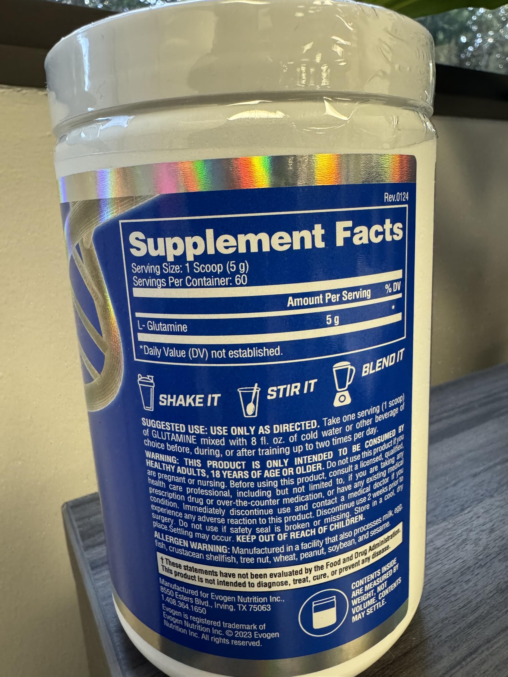 Evogen L-Glutamine Powder 300g with gym equipment background