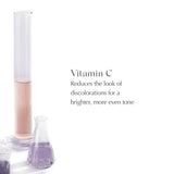 EXUVIANCE Vitamin C Serum Capsules displayed on a bathroom counter