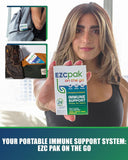 EZC Pak On The Go daily wellness support system held in hand