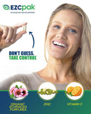 EZC Pak On The Go daily wellness support system with a glass of water