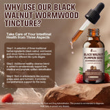 Femmetra Herbal Cleanse Drops on a wooden table