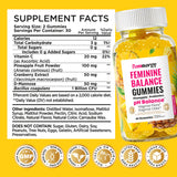 Femnergy Feminine Balance Gummies bottle with a measuring spoon