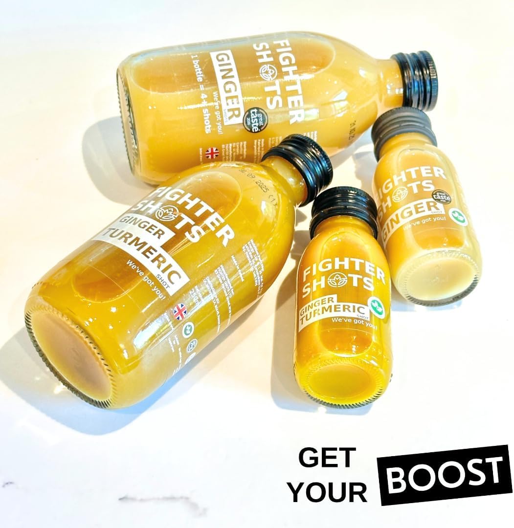 Fighter Shots Ginger and Turmeric Wellness Shots on a wooden table
