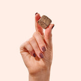 Fiome Dietary Fibre Supplement bites in a bowl with cocoa powder
