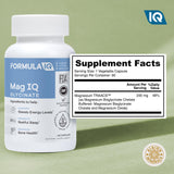 FIQ Magnesium Bisglycinate Capsules on a wooden table