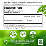 FitVitality Moringa Leaf Extract Capsules 1000mg capsules on a spoon