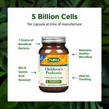 Flora Children's Care Probiotic 5 Billion CFU capsule on wooden table