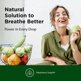 Flora RespirEssence herbal supplement in a glass of warm water