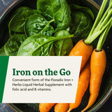 Floradix Iron & Vitamin Tablets with a measuring spoon