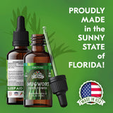 FLORIDA HERBS Mugwort Extract Liquid Drops on a wooden table