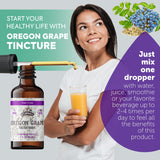 FLORIDA HERBS Oregon Grape Extract 181g on a wooden table