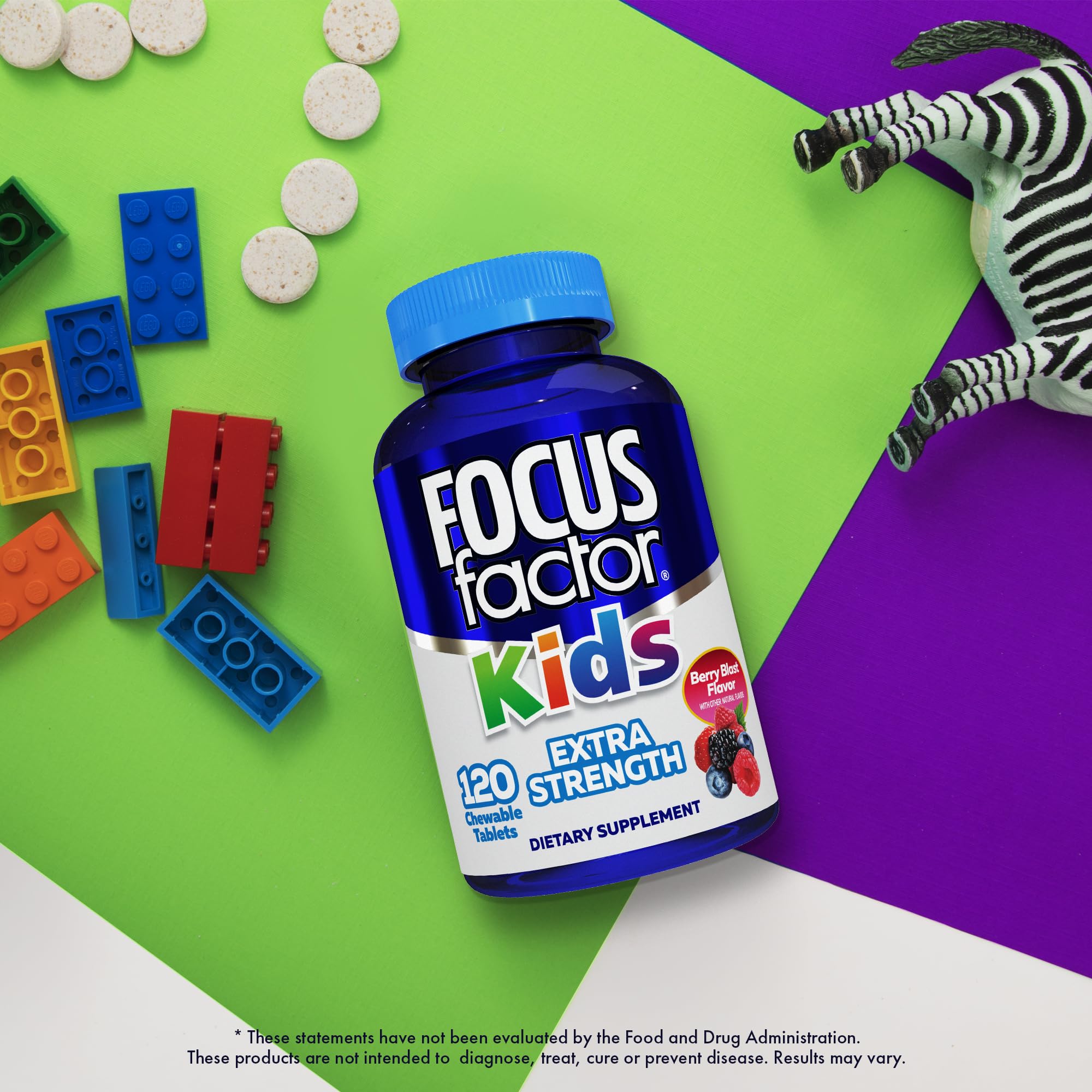 Focus Factor Kids Extra Strength Multivitamins on a table with fruits
