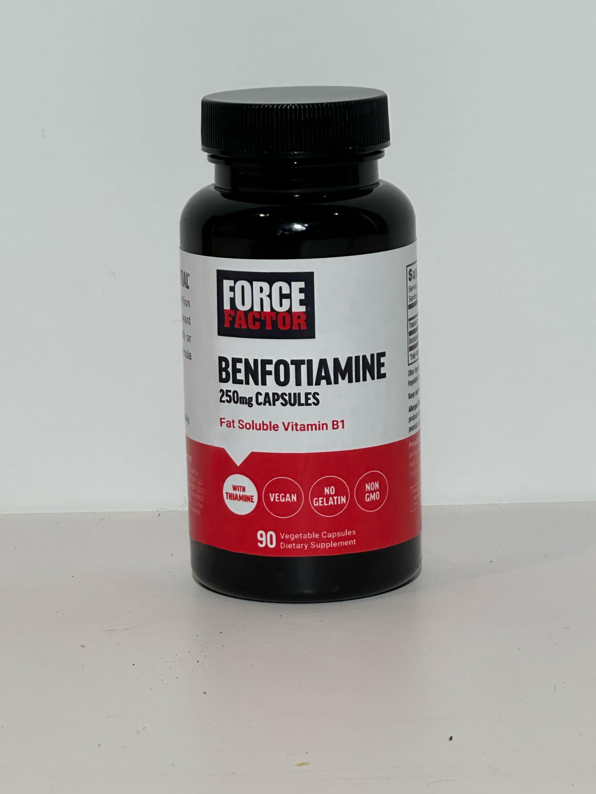 Force Factor Benfotiamine capsules in a hand