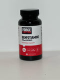 Force Factor Benfotiamine capsules in a hand