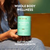 FR!SKA Women’s Daily Multi-Enzymes with a glass of water