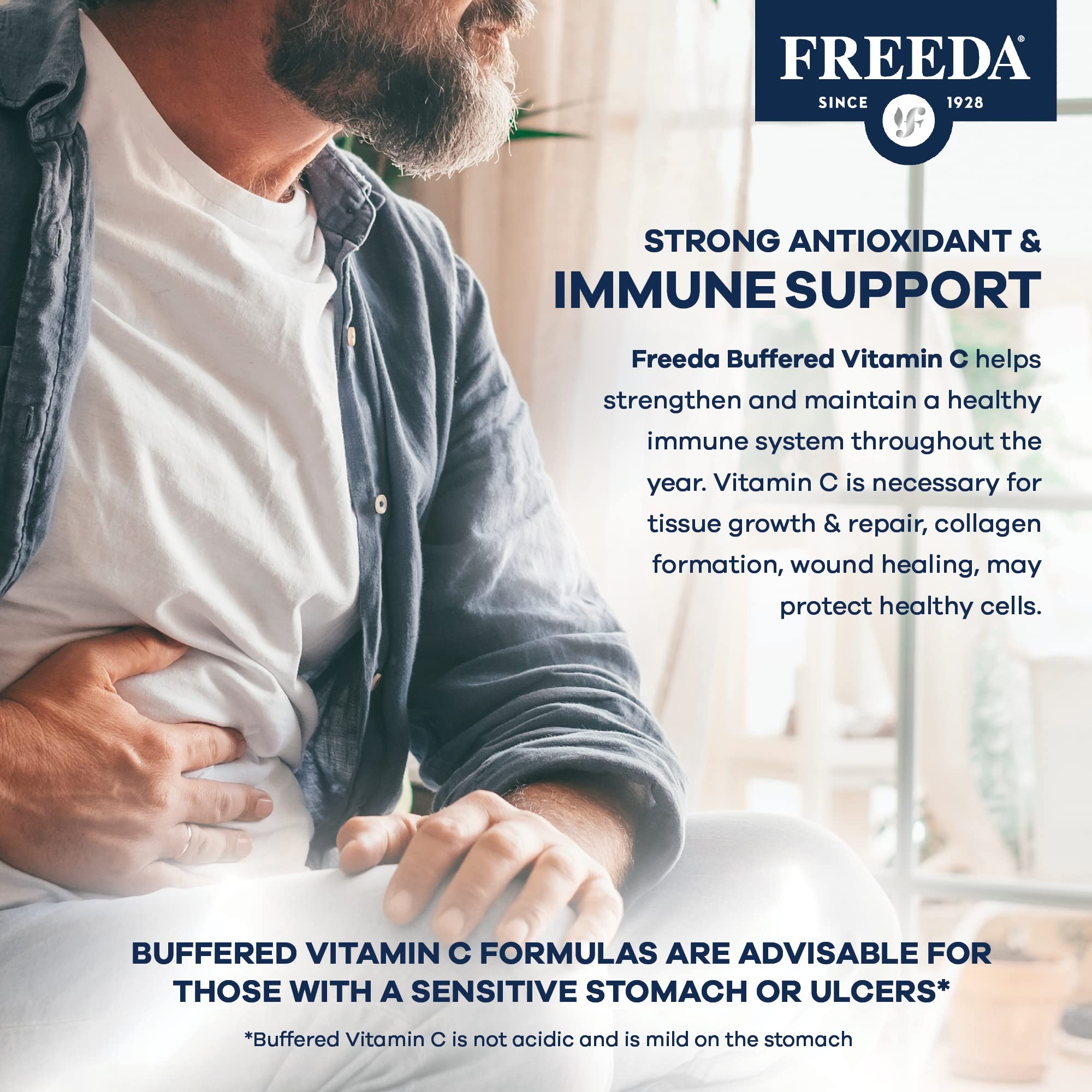 FREEDA Buffered Vitamin C 500mg capsules on a wooden table