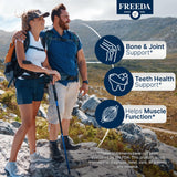 FREEDA Calcium Tablets 600mg bottle with a glass of water