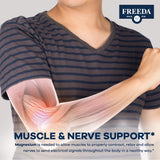 FREEDA Magnesium Gluconate 2000mg vegan tablets on a wooden table