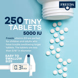 FREEDA Vitamin D3 5000 IU supplement with a glass of water