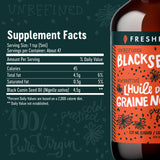 Freshfield Black Seed Oil 227g lifestyle scene with plant background