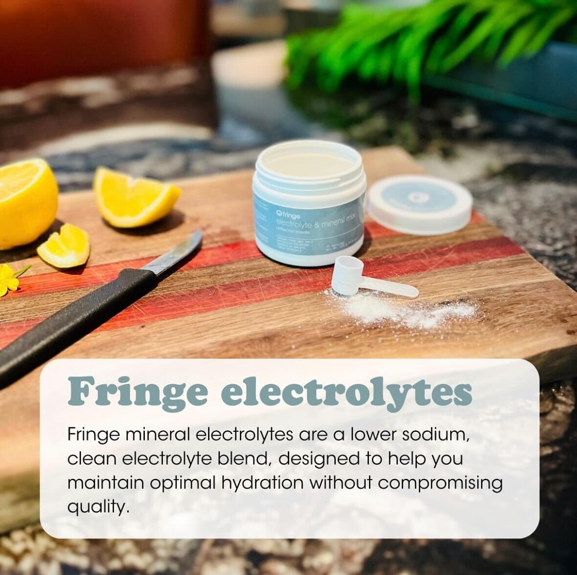 Fringe Essential Mineral Blend 79g powder in a scoop