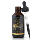 Fulvika Trace Mineral Drops with glass of water