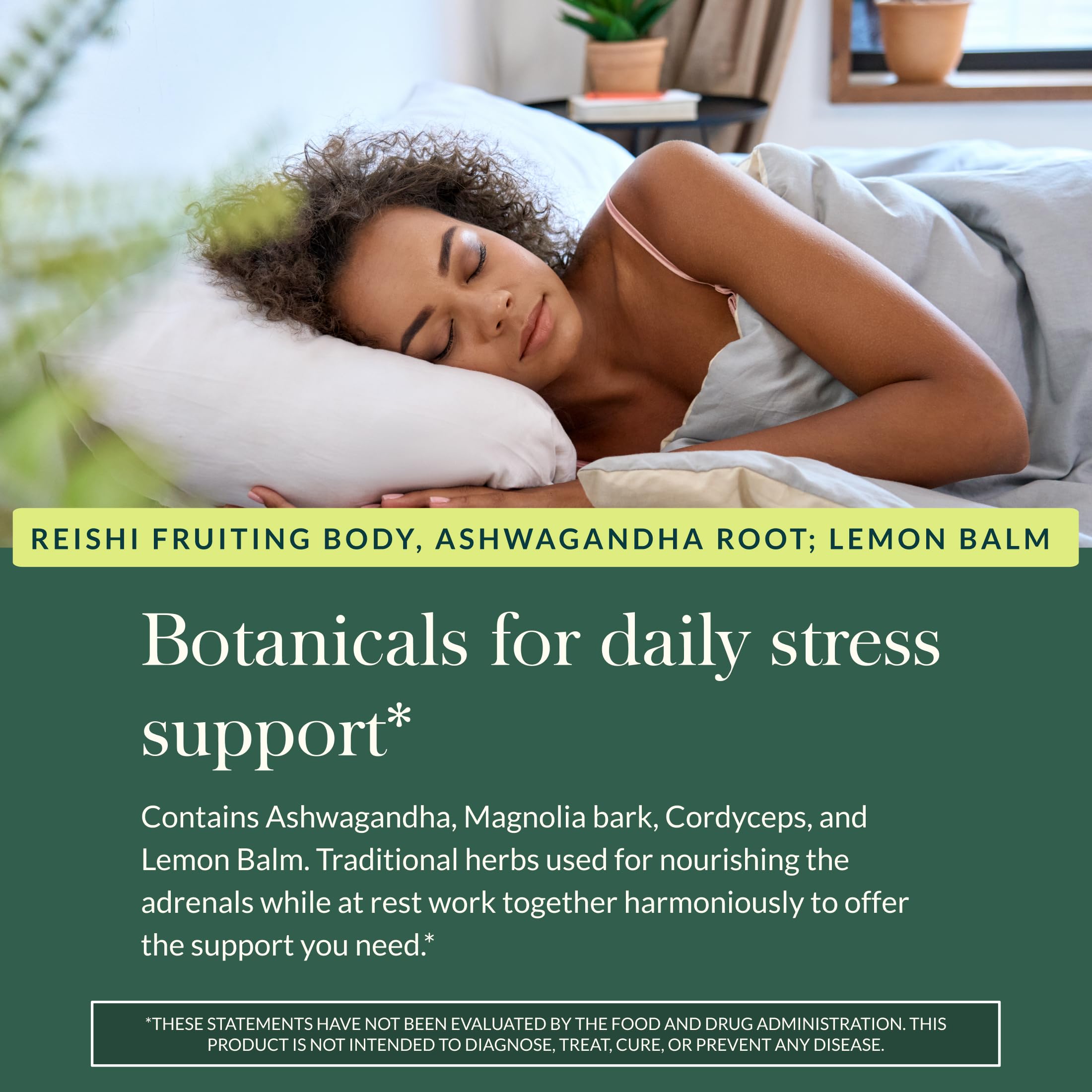Gaia Herbs Adrenal Health Nightly Restore capsules on a spoon