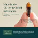 Gaia Herbs Cranberry Concentrate 420mg capsules on a wooden surface