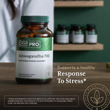 Gaia Herbs PRO Ashwagandha Supplement with a measuring spoon