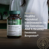 Gaia Herbs PRO Oil of Oregano 230mg supplement bottle with herbs background