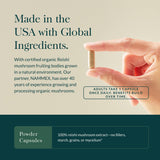 Gaia Herbs Reishi Mushroom Supplement capsules in a hand