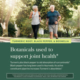 Gaia Herbs Turmeric Curcumin Extract capsules on a wooden surface