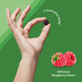 Garden of Life Calcium Magnesium Gummies with fresh raspberries