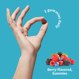 Garden of Life daily wellness Gummies displayed with a measuring spoon