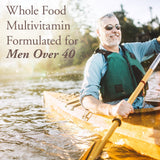 Garden of Life Men's Multivitamin 40+ tablets on a wooden surface