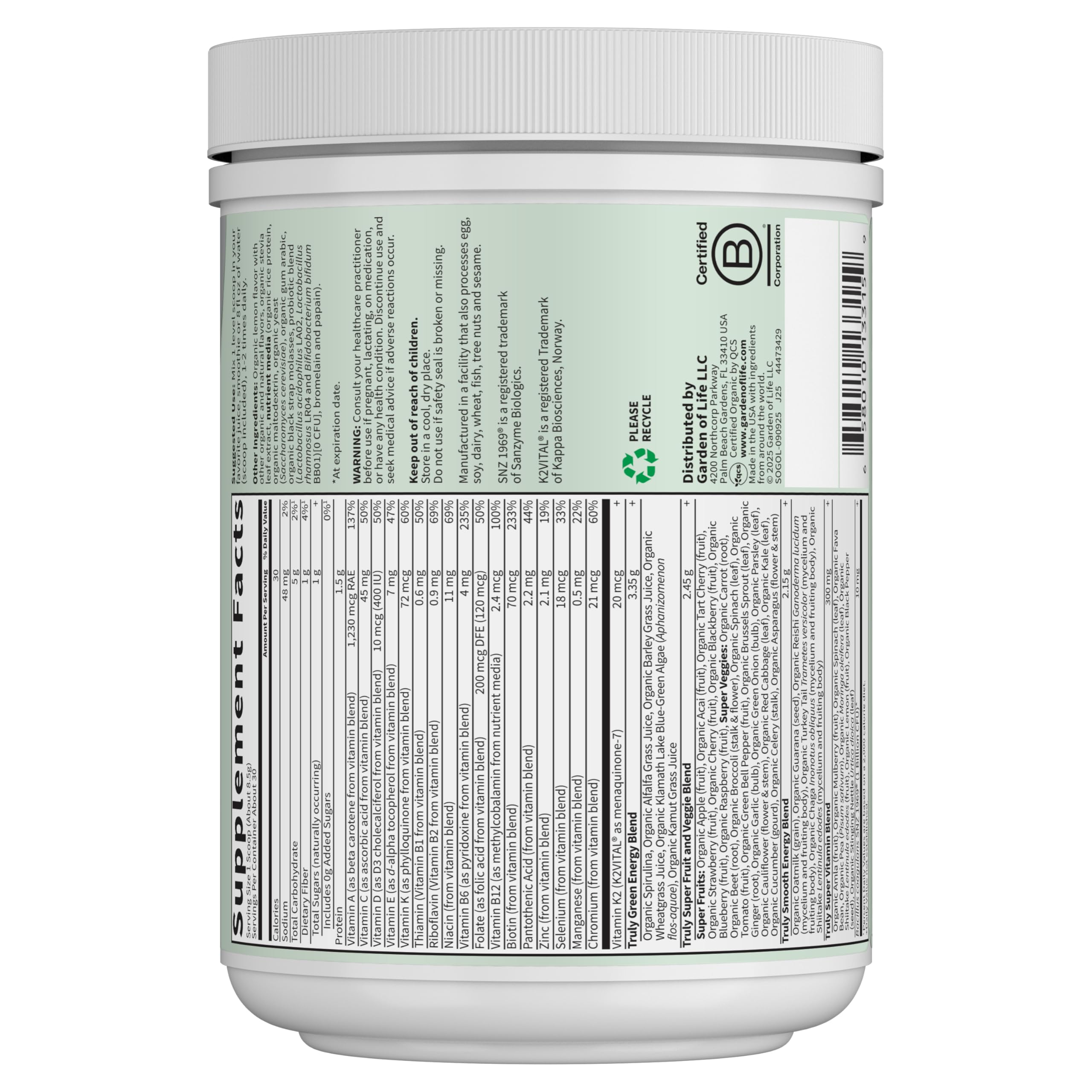 Garden of Life Organic Greens Superfood Powder in a glass of water