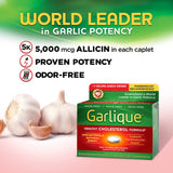 Garlique supplement caplet on a wooden table
