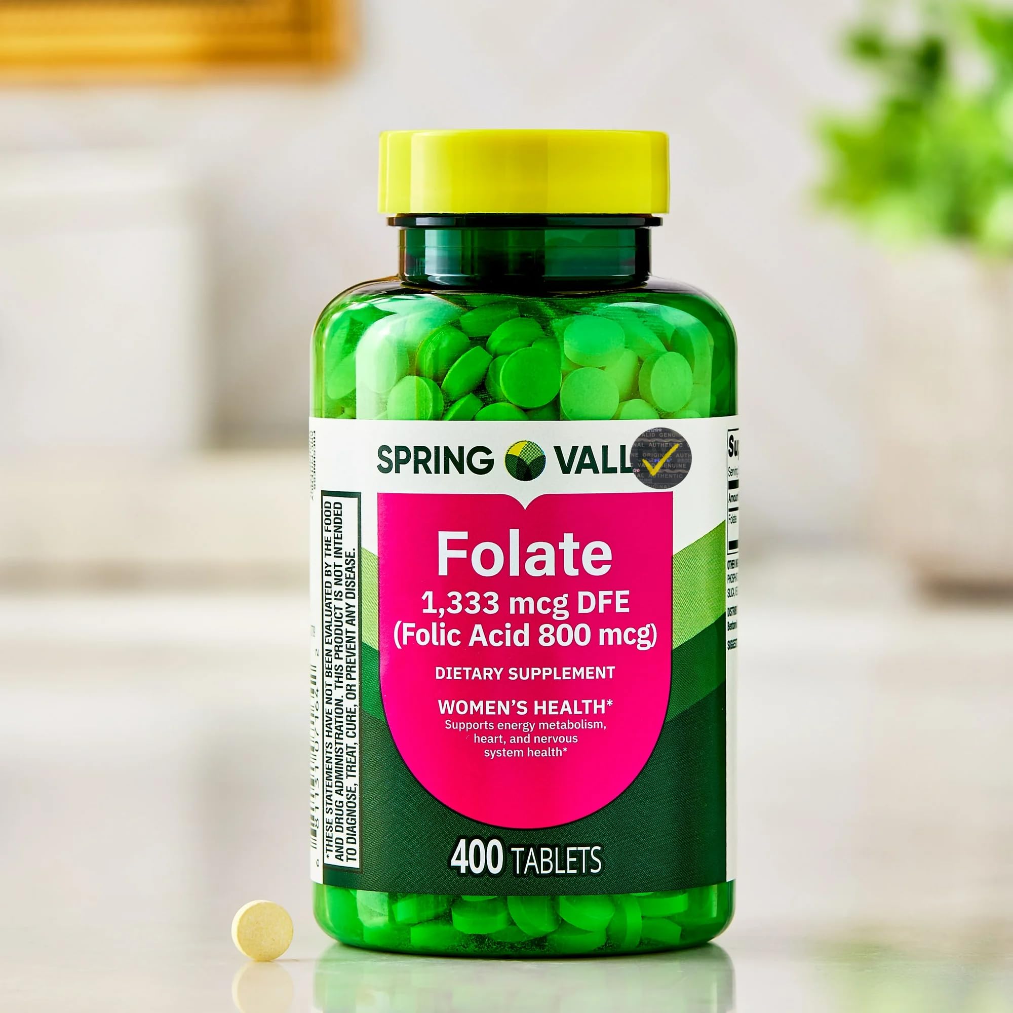 Generic Folate Supplement 400 tablets close-up of tablets