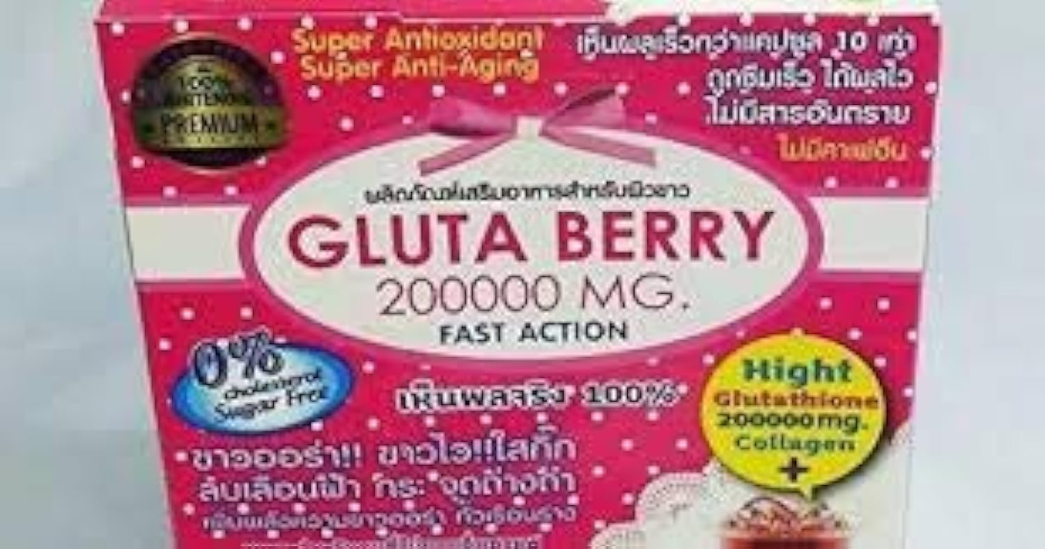 Gluta Berry Drink Punch sachet in a hand for size reference