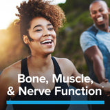GNC Magnesium Glycinate 200mg caplets with a measuring spoon