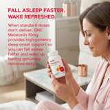 GNC Melatonin 10mg Sleep Aid 60 Tablets with a glass of water