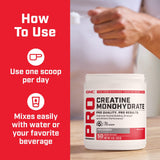 GNC Pro Performance Creatine Monohydrate Powder with workout gear