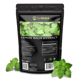 Go Nutra Lemon Balm Herbal Supplement 10:1 Extract on a wooden table