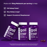 Goli Extra-Strength Sleep Gummies with a hand holding a gummy