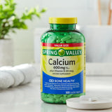 GoodDealsHouse Calcium Supplement 600mg + Vitamin D tablets close-up