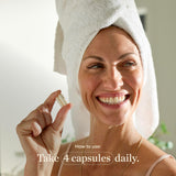 Great Lakes Wellness Collagen Peptides Capsules with a glass of water