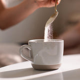 Great Lakes Wellness Flavoured Collagen Peptides Powder on a kitchen counter