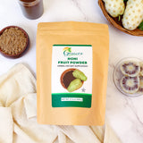 Grenera Noni Fruit Powder mixed in a glass of water