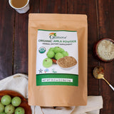 Grenera Organic Amla Powder 998g displayed with fresh Amla fruits